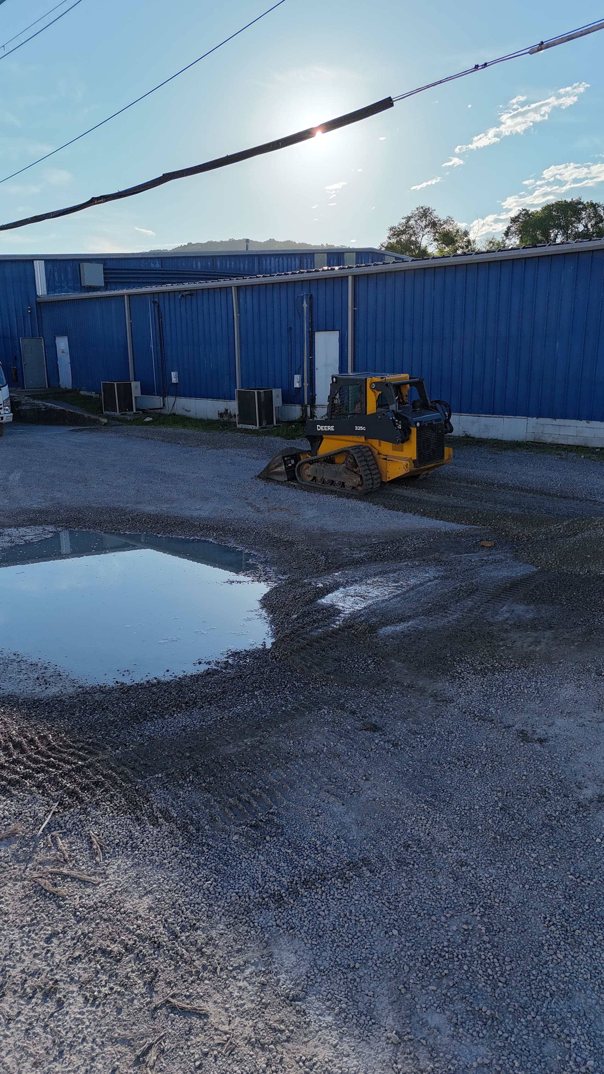 Gallery photos for Pothole Repair and Lot Regrading for a Commercial Loading Area: Image #1